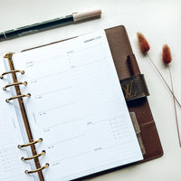 Squizzleberry 2026 weekly planner insert open in Louis Vuitton GM agenda minimalist stationery UK